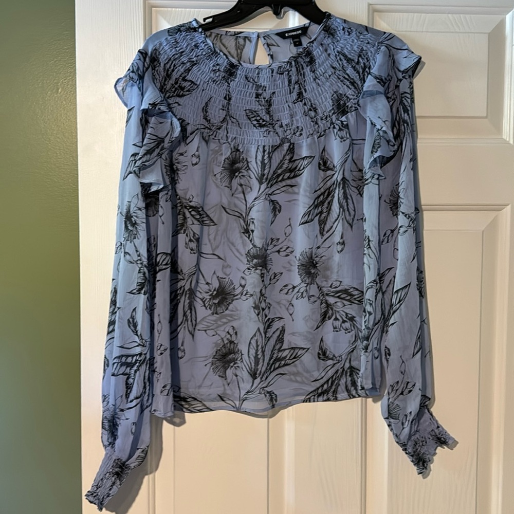 Express top great for the office or a night out with a black Cami under!